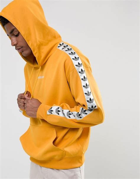 adidas originals tape hoodie yellow|adidas tnt tape hoodie.